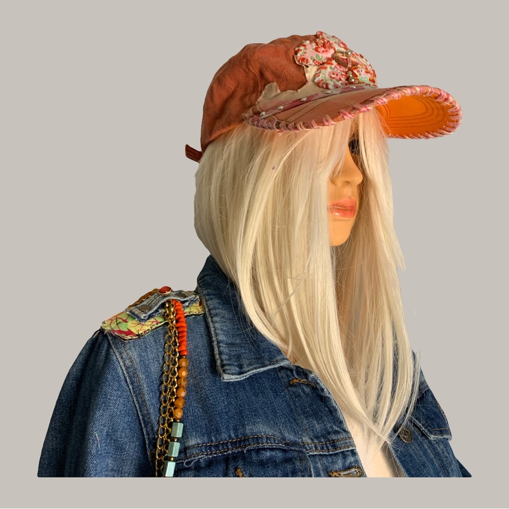 Embellished Orange Cap with Floral Accent